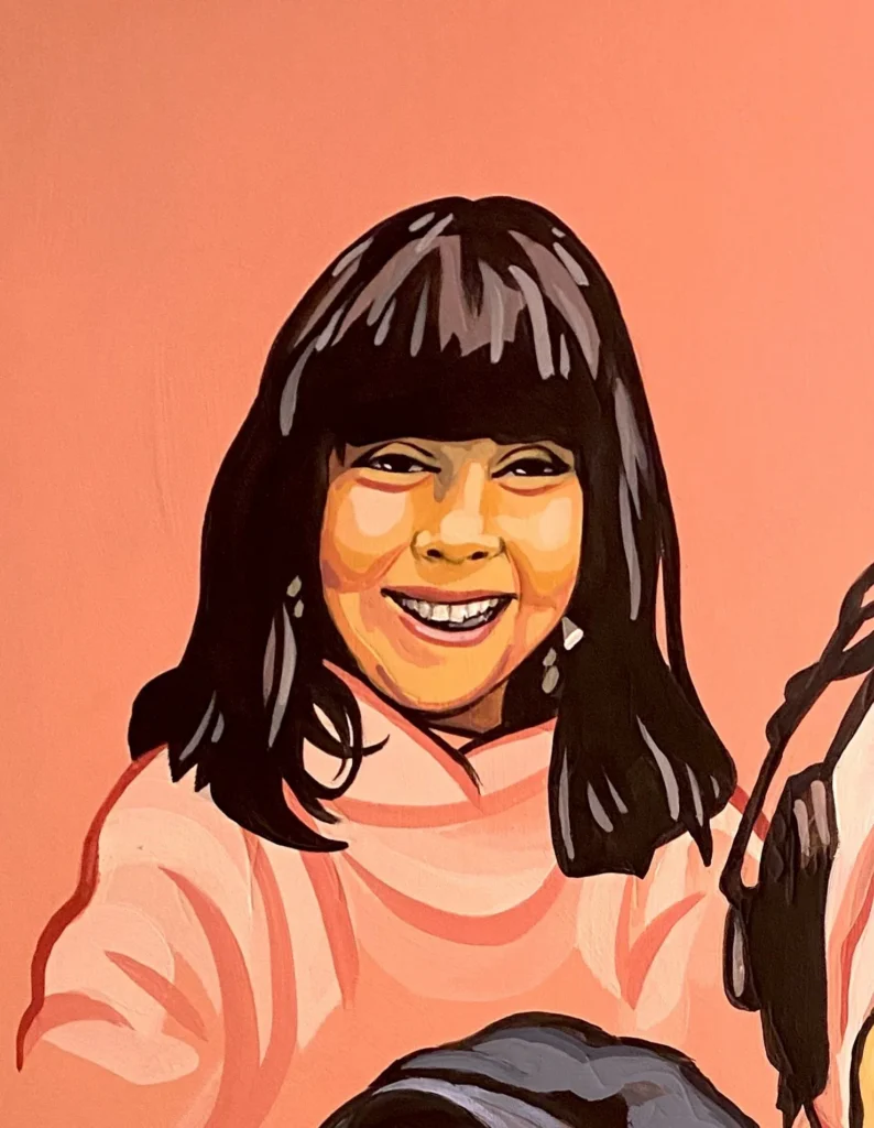 Sidra Hassouna, Martyrs & Heroes, Portrait by Caleb Wassell: a smiling Palestinian girl with dark bangs in a pink sweater.