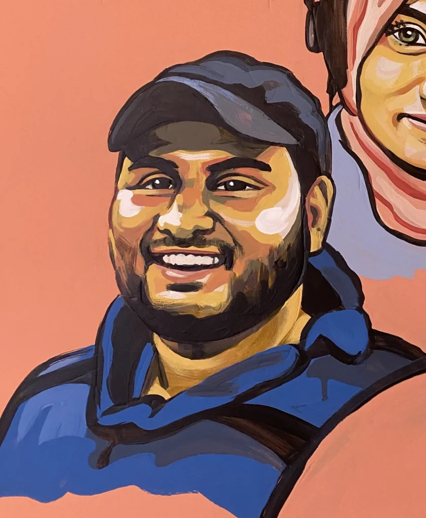 Hamza al-Dahdouh, Martyrs & Heroes, Portrait by Caleb Wassell: a smiling bearded Palestinian journalist man in a cap and blue jacket.