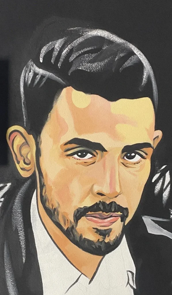 Rifaat Radwan, Martyrs & Heroes, Portrait by Caleb Wassell: a young paramedic Palestinian man with styled dark hair, painted in black and white.