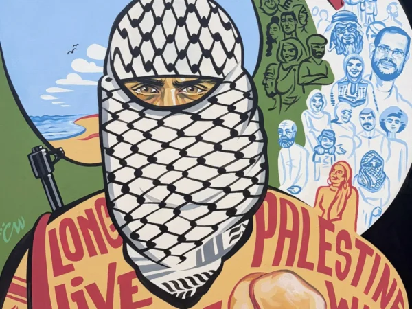 Palestine Will Never Die, painting by Caleb Wassell: a masked figure in a keffiyeh holding a key, surrounded by hand-lettered slogans and a Palestinian crowd on the beach with a kite flying and a Yaffa orange.