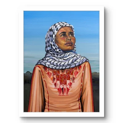 The Original fine art print by Caleb Wassell: a Palestinian woman in a keffiyeh headscarf and embroidered thobe gazing upward against a blue sky, shown framed.